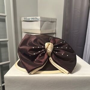 Elegant Brown and Cream Hat with Bow